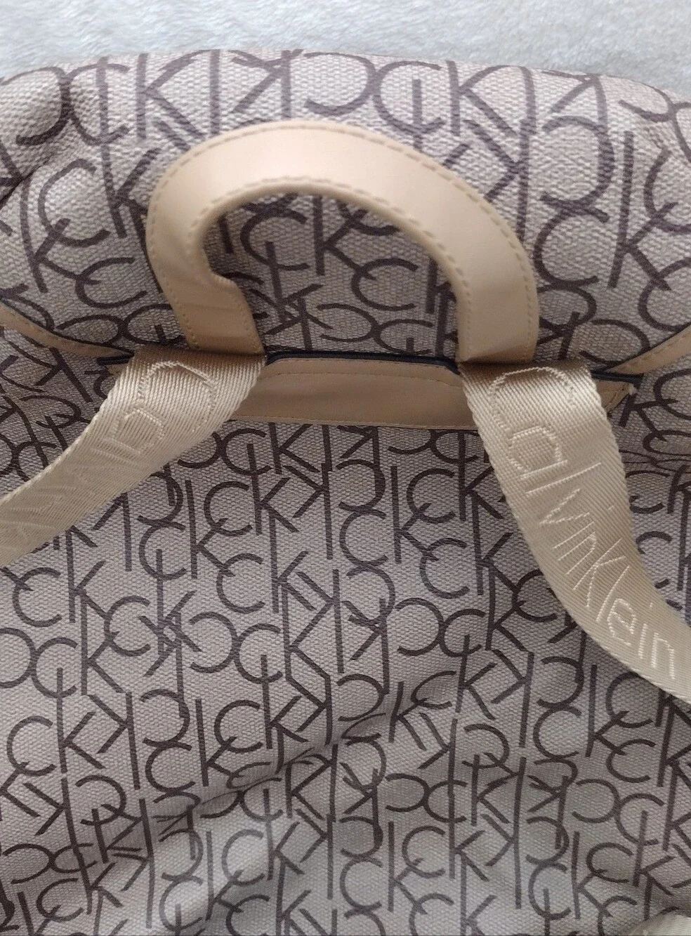 Calvin Klein Monogram Drawstring Backpack in Beige and Brown